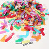 A pile of colorful confetti paper shreds in various shades of pink, green, yellow, and orange.