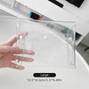 A hand holds a clear transparent PVC cosmetic bag designed for waterproof storage of makeup brushes and other items.