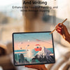A hand is using a stylus to draw on an iPad screen protector while writing.