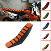 Orange and black striped soft grip seat cover for a motorcycle.