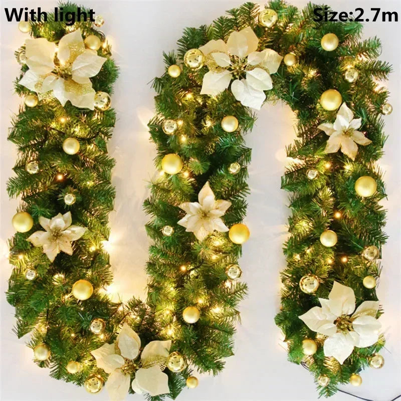 A long green LED garland shaped like the letter U decorated with white flowers and gold accents.