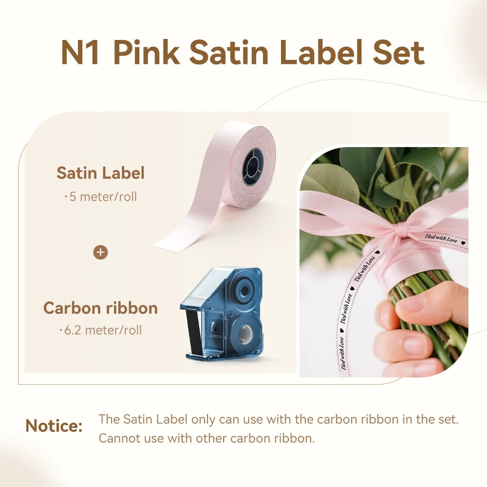 Set of pink satin labels and carbon ribbon rolls for an N1 printer.