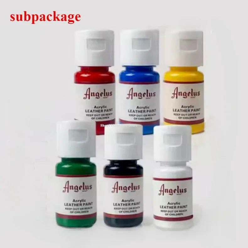 A collection of Angelus acrylic leather paint bottles in various colors and sizes with white caps.