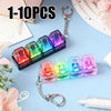A set of 10 LED clickable fidget keychains with a keyboard design displayed on a blue background.
