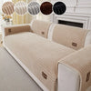 A beige minimalist sofa cushion cover with ribbed texture and decorative fabric options displayed on a light-colored sofa.