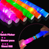 A collection of colorful LED flash pop tubes displayed diagonally against a black background.
