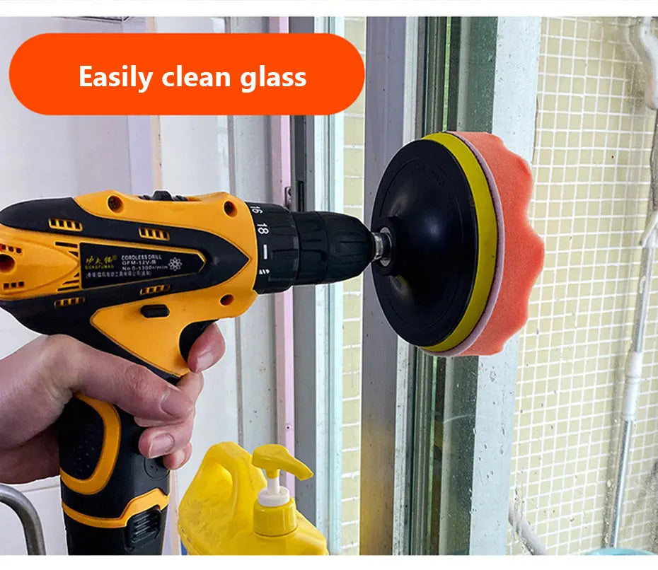 A hand uses a cordless electric tool to clean glass, demonstrating easy cleaning.