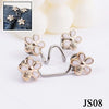Silver and gold floral buttons used as no-sew adjustable waist tightener buttons for jeans