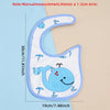A light blue waterproof baby bib with a cartoon whale print shown against a pale background.