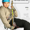 A man wearing a helmet and climbing harness is holding a light weight auxiliary rope for safety.