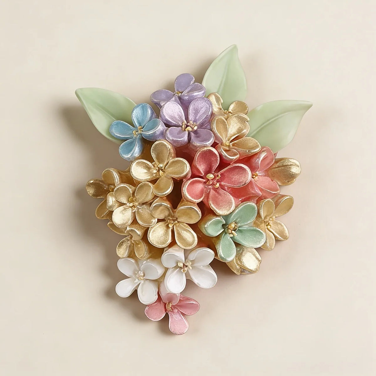 A cluster of colorful 3D rose silicone molds in shades of purple, pink, and cream with green leaves.