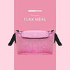 A pink flax meal pouch or organizer bag for a stroller, featuring a cup holder.