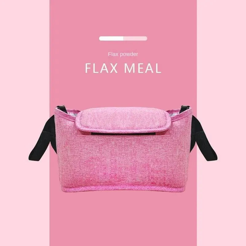 A pink flax meal pouch or organizer bag for a stroller, featuring a cup holder.
