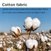 White cotton bolls on a plant stem against a blue sky