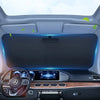Interior view of a car showing a sunshade installed on the windshield and dashboard area.