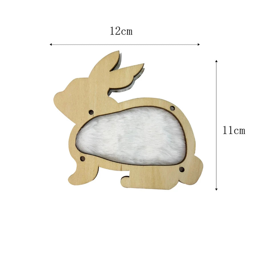 A wooden bunny shape with a felt interior, used as a Montessori busy board part for fine motor skills.