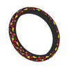 A steering wheel cover featuring a camouflage pattern of red, yellow, and black leaves.