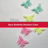 Six pieces of glow-in-the-dark butterfly wall stickers in various colors like teal, lime green, and pink.