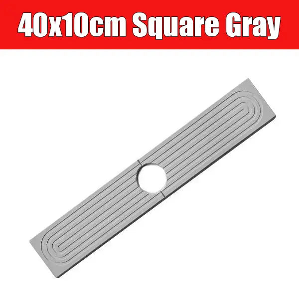 A gray square mat with raised lines and a hole, designed as a quick-dry faucet mat.