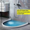 A flexible shower water dam barrier is installed in a bathtub to stop water from flowing out and make it watertight.