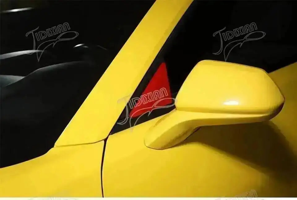 Yellow interior and exterior trim kit for a Chevrolet Camaro showing a close-up detail.