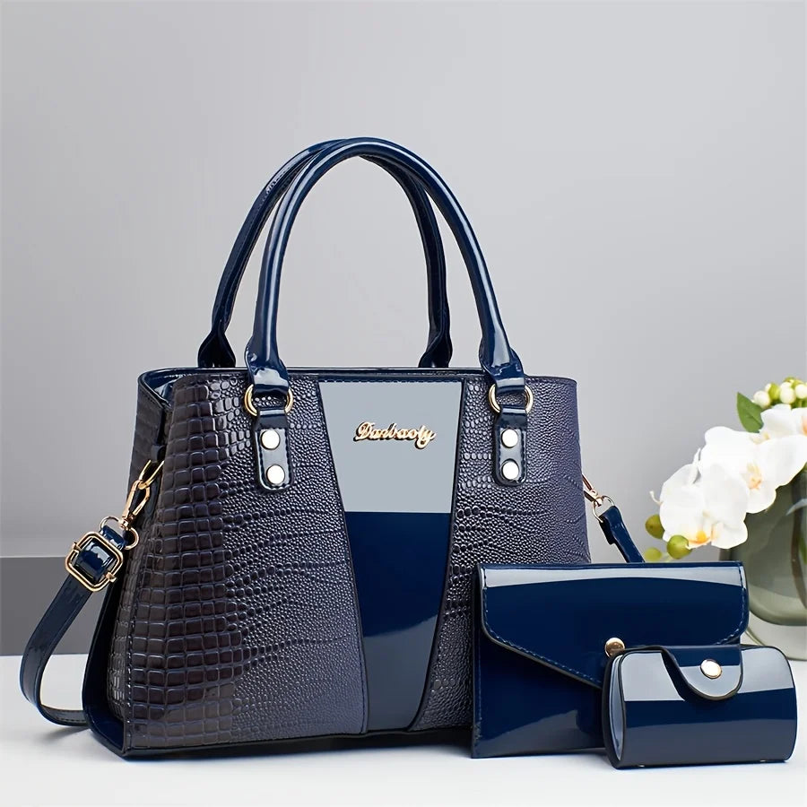 Marineblaue Crocodile-Imitat-Ledertasche-Set mit großer Tasche und Clutch.