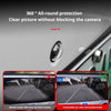 A close-up view of a car camera lens protector being applied to a rear view backup camera.