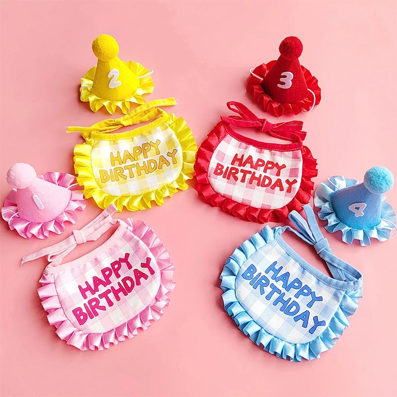 A set of pet birthday party hats and bibs in yellow, red, and blue for cats and small dogs