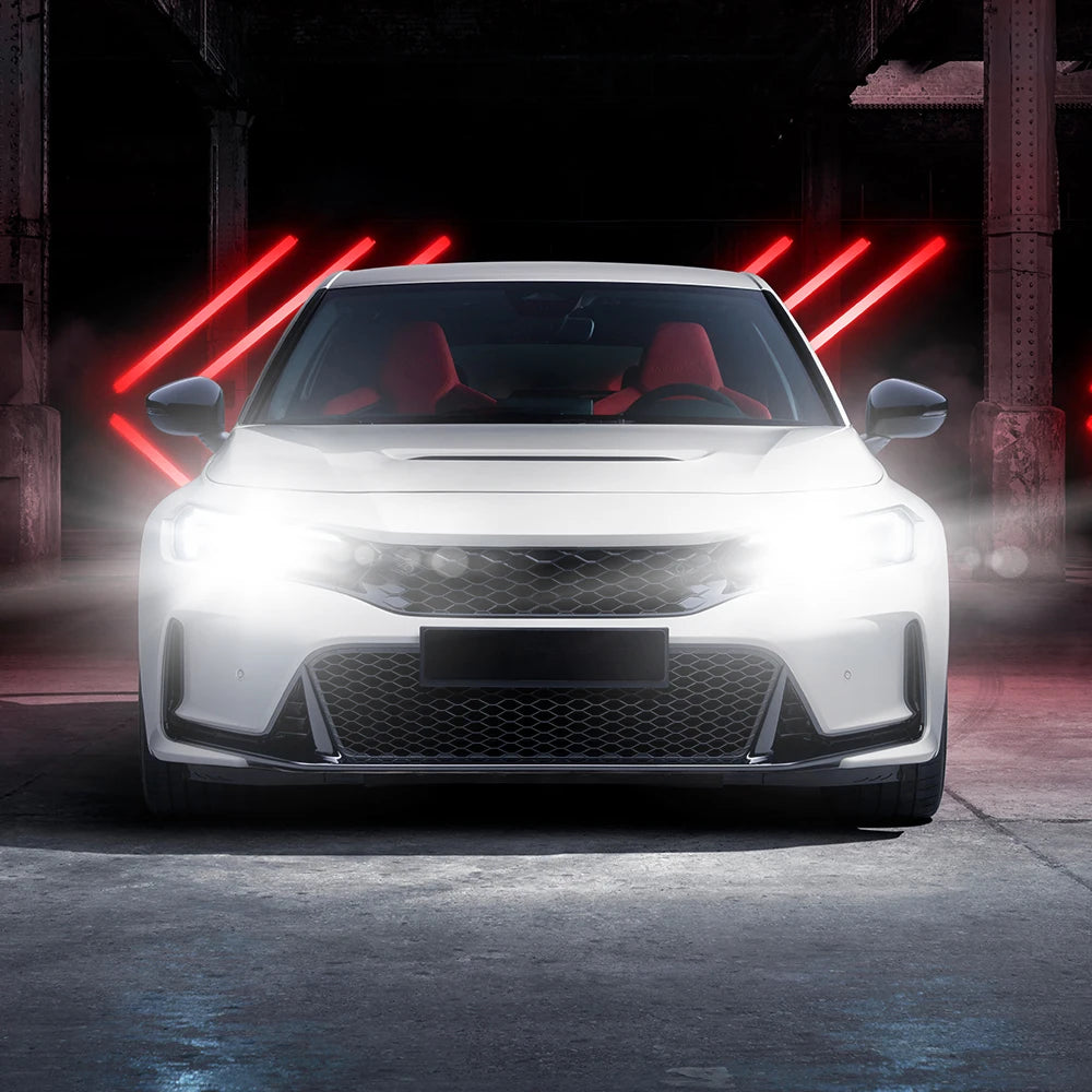 A white car with red interior is shown in a dark setting, featuring bright LED headlights and red accent lights.