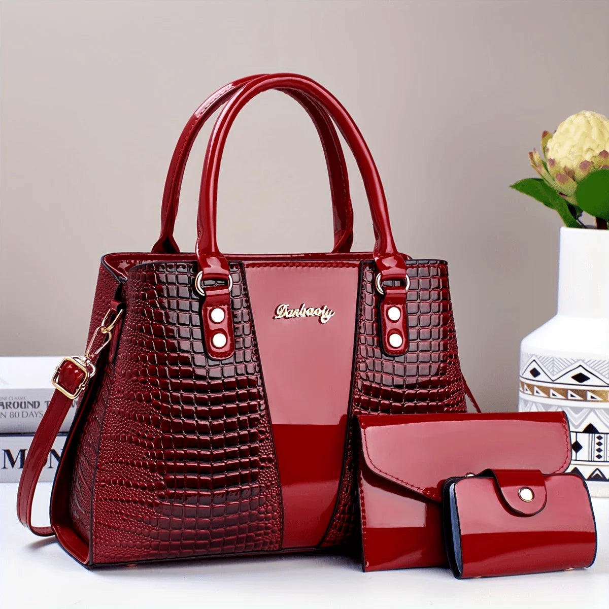 Marooner Crocodile-Muster-Patentleder-Handtaschenset mit Haupttasche und Clutch.