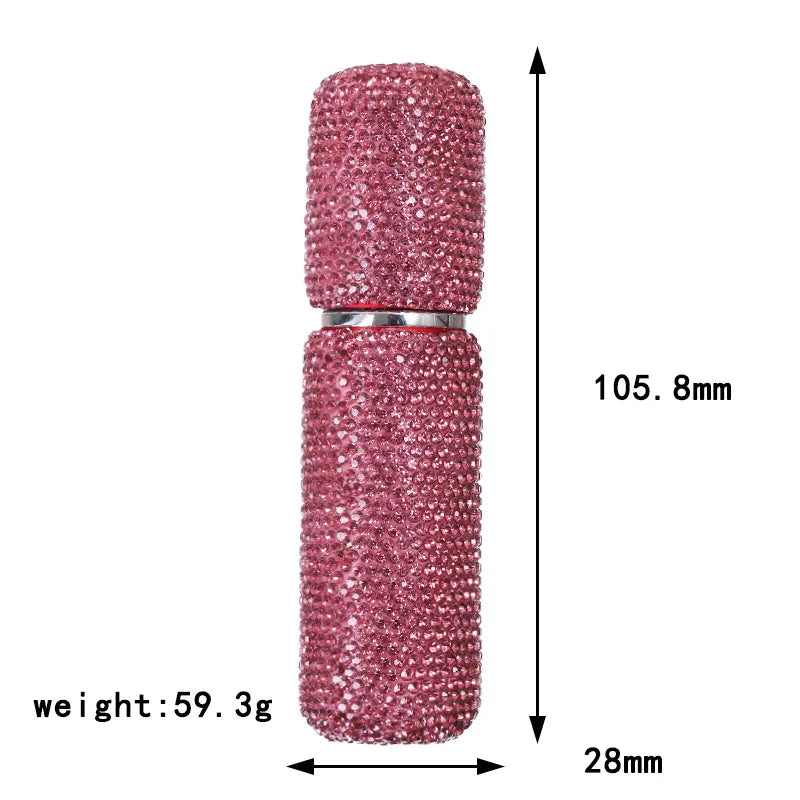 A pink refillable glass perfume atomizer with a fine mist spray, shown vertically.