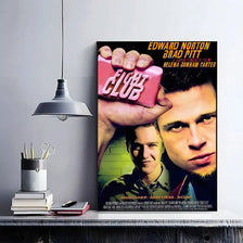 Poster for Fight Club featuring Brad Pitt and Helena Bonham Carter, displayed on a shelf.