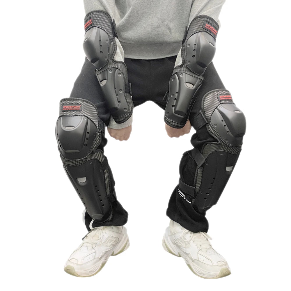Black impact-resistant motorcycle knee and elbow protective pads worn on a person's legs.