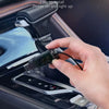 A hand plugs a USB power supply into a car interior component to install an LED light strip.