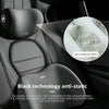 Black technology anti-static memory foam car headrest and lumbar support pillow set in a car interior.