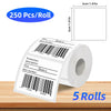 Roll of white thermal label paper with barcode and product information on a wooden surface