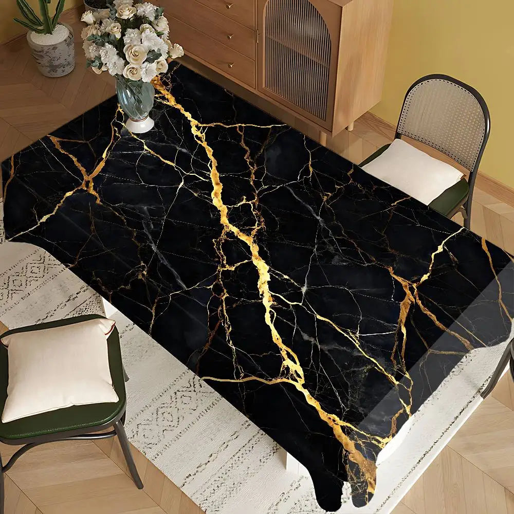 Black gold marble waterproof tablecloth displayed on a wooden table with a green chair and white rug.