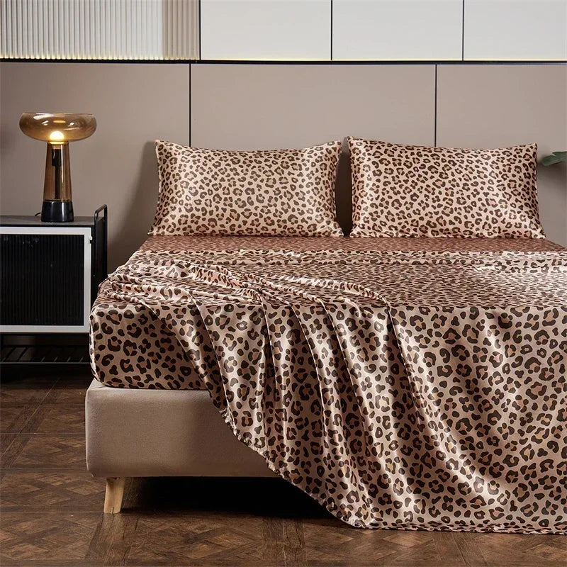 Luxury satin leopard print bedding set displayed on a bed with neutral tones.