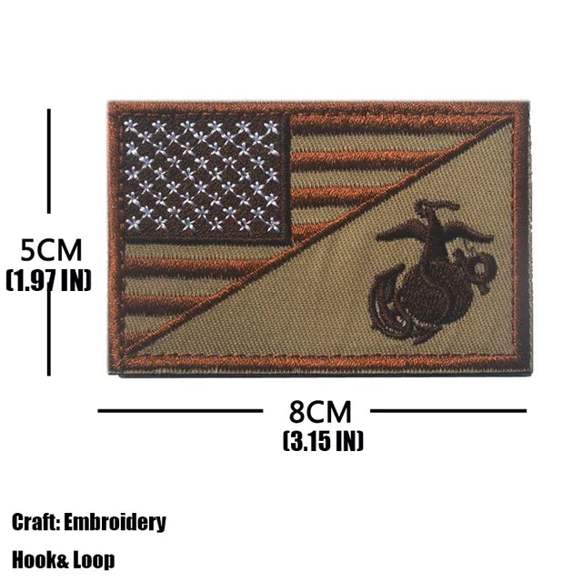 An embroidered tactical patch featuring an American flag design and a silhouette of an eagle on a tan background.