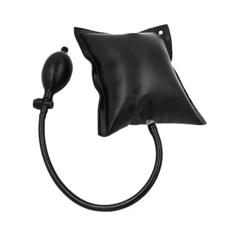 Black inflatable air wedge tool used for car door and window repair