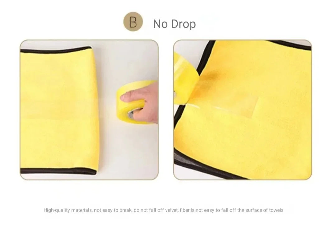 Yellow microfiber towel demonstrating no drop feature, showing its absorbency and quality.