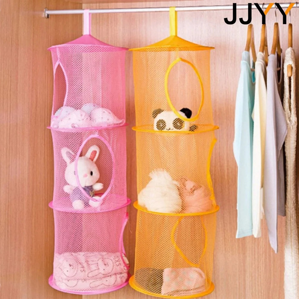 A 3-tier mesh hanging storage organizer in pink and orange for hanging small items like stuffed animals.