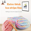A ball of pink and purple extra thick ice stripe line chenille yarn for knitting projects.