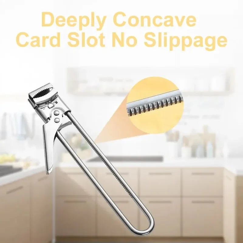 A close-up view of a deeply concave card slot jar opener made of stainless steel.