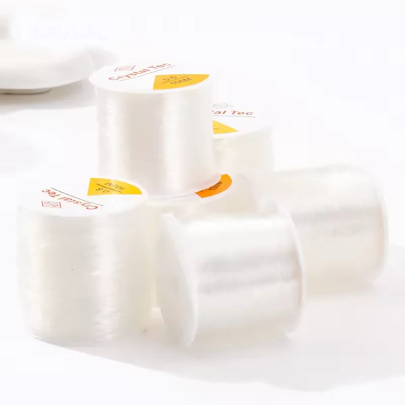 Rolls of transparent elastic cord for jewelry making and beading