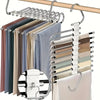 A display of 9-layer non-slip stainless steel pants hangers in various neutral and muted colors.