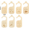 A set of wooden baby closet dividers with cartoon labels for newborn to 18-24 months.