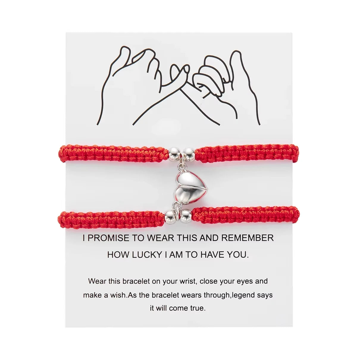 A pair of red magnetic heart couple bracelets with a promise message on a white card.