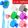 A set of 10 portable toothbrush head covers in various colors and shapes with clips.