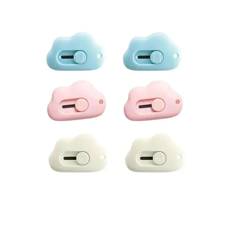 Three versions of a compact rabbit mini cutter with a retractable blade in light blue, pink, and white.